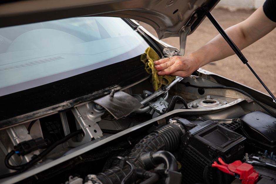Auto glass repair tools being used on a chip